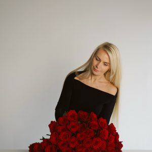 Classic Charm bouquet of red roses wrapped in black paper by DV Flowers