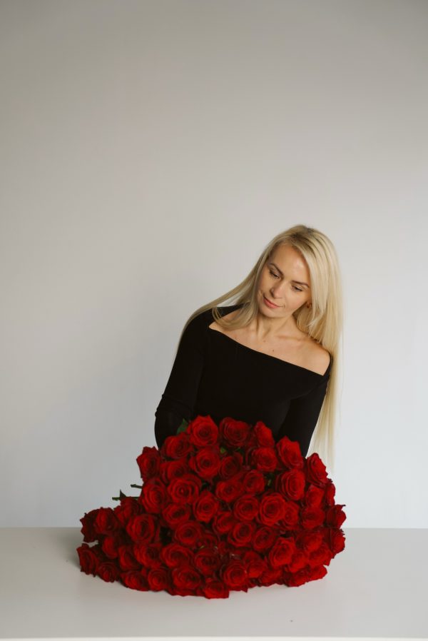 Classic Charm bouquet of red roses wrapped in black paper by DV Flowers