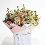 Pastel Luxe bouquet with blush roses and seasonal flowers by DV Flowers