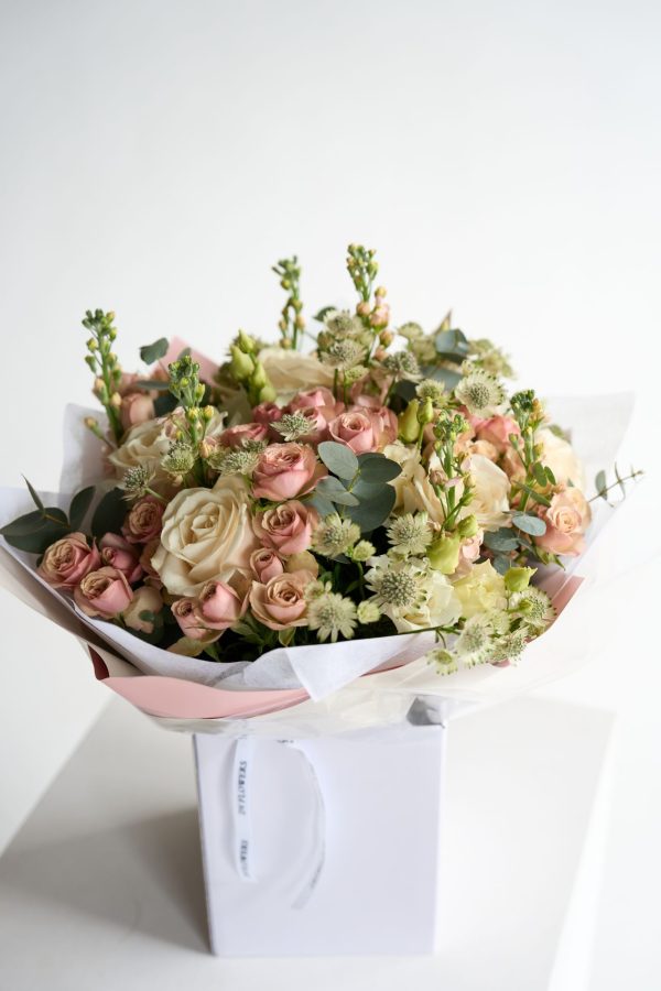 Pastel Luxe bouquet with blush roses and seasonal flowers by DV Flowers