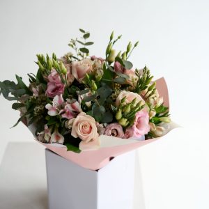 Pink Whisper bouquet with blush roses and pink lisianthus by DV Flowers