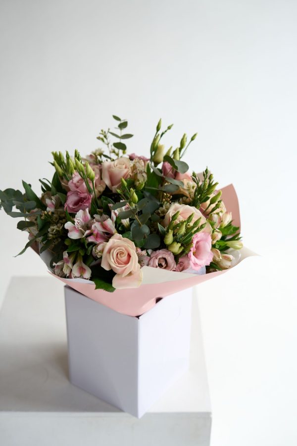 Pink Whisper bouquet with blush roses and pink lisianthus by DV Flowers