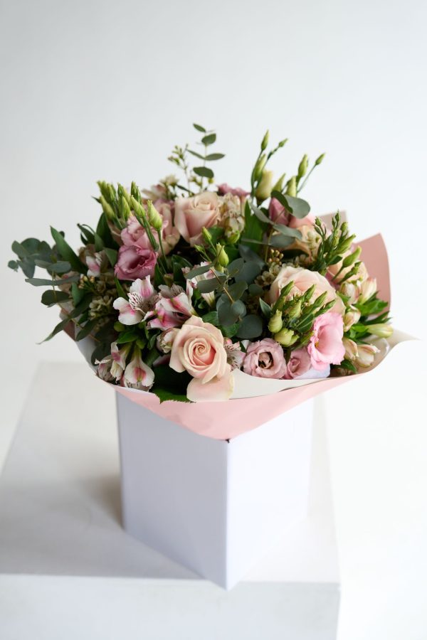 Pink Whisper bouquet with blush roses and pink lisianthus by DV Flowers
