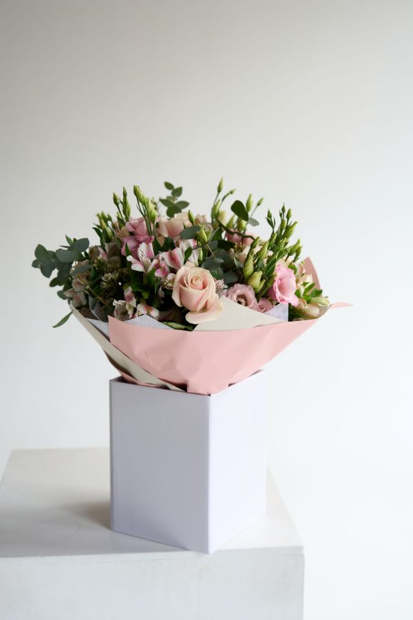 Pink Whisper bouquet with blush roses and pink lisianthus by DV Flowers