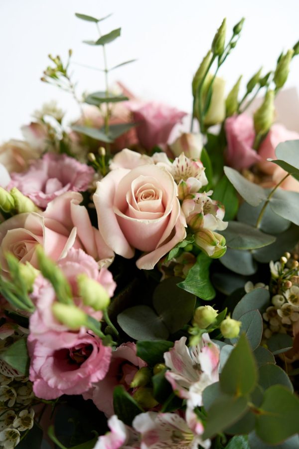 Pink Whisper bouquet with blush roses and pink lisianthus by DV Flowers