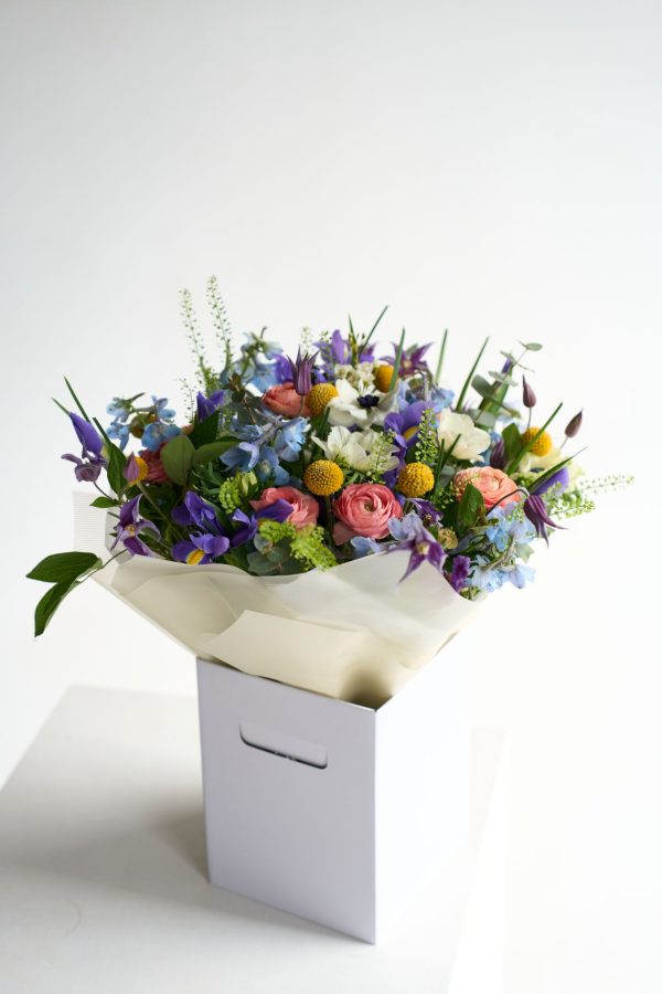 Spring Bloom Collection bouquet with blush roses and pink lisianthus by DV Flowers