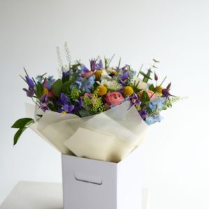 Spring Bloom Collection bouquet with blush roses and pink lisianthus by DV Flowers