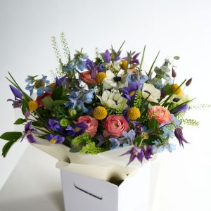 Spring Bloom Collection bouquet with blush roses and pink lisianthus by DV Flowers