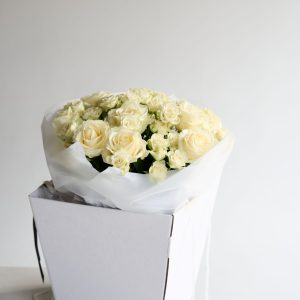 The Classic Rose bouquet with cream and white roses by DV Flowers